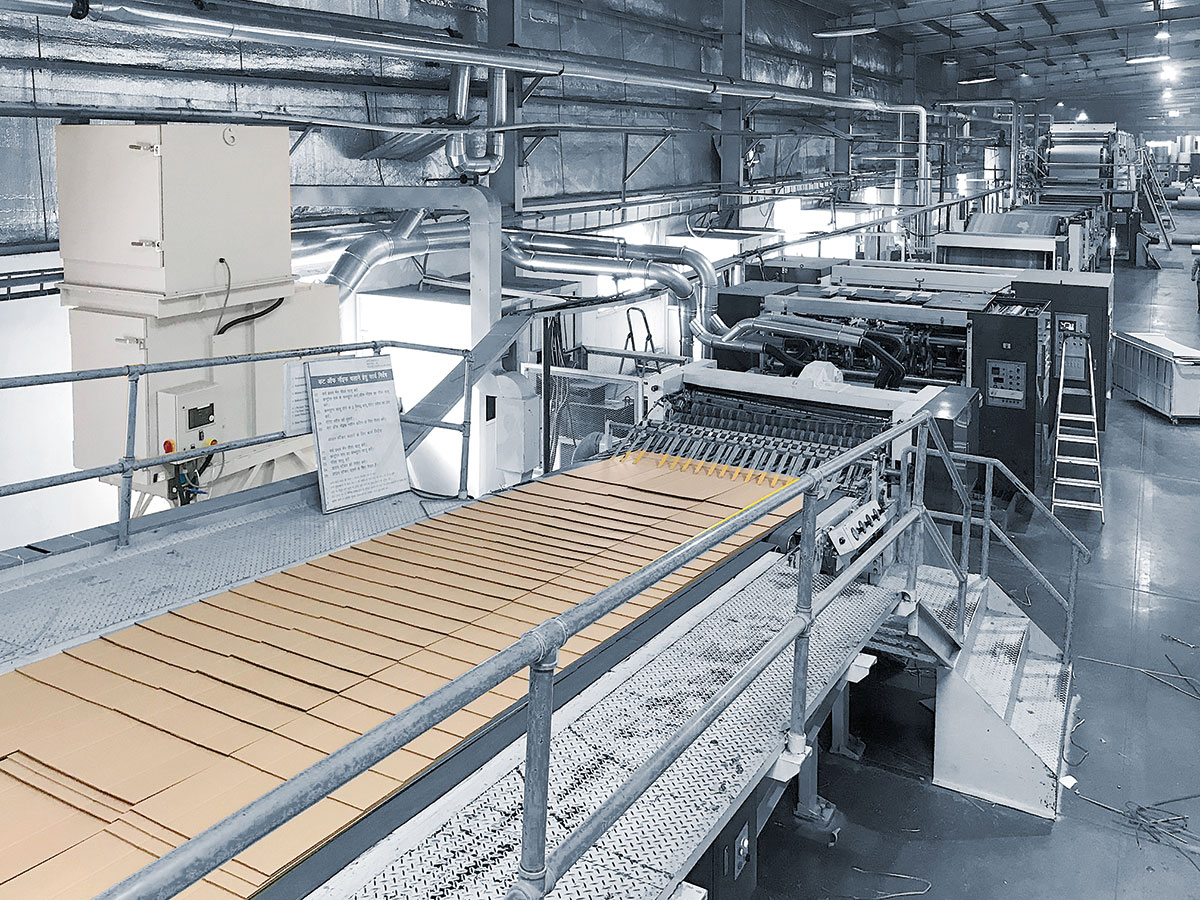 Solution de nettoyage de bande KELVA dans la fabrication de carton ondulé